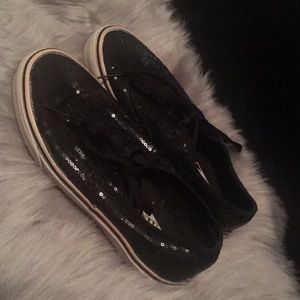Vans sparkly black shoes.